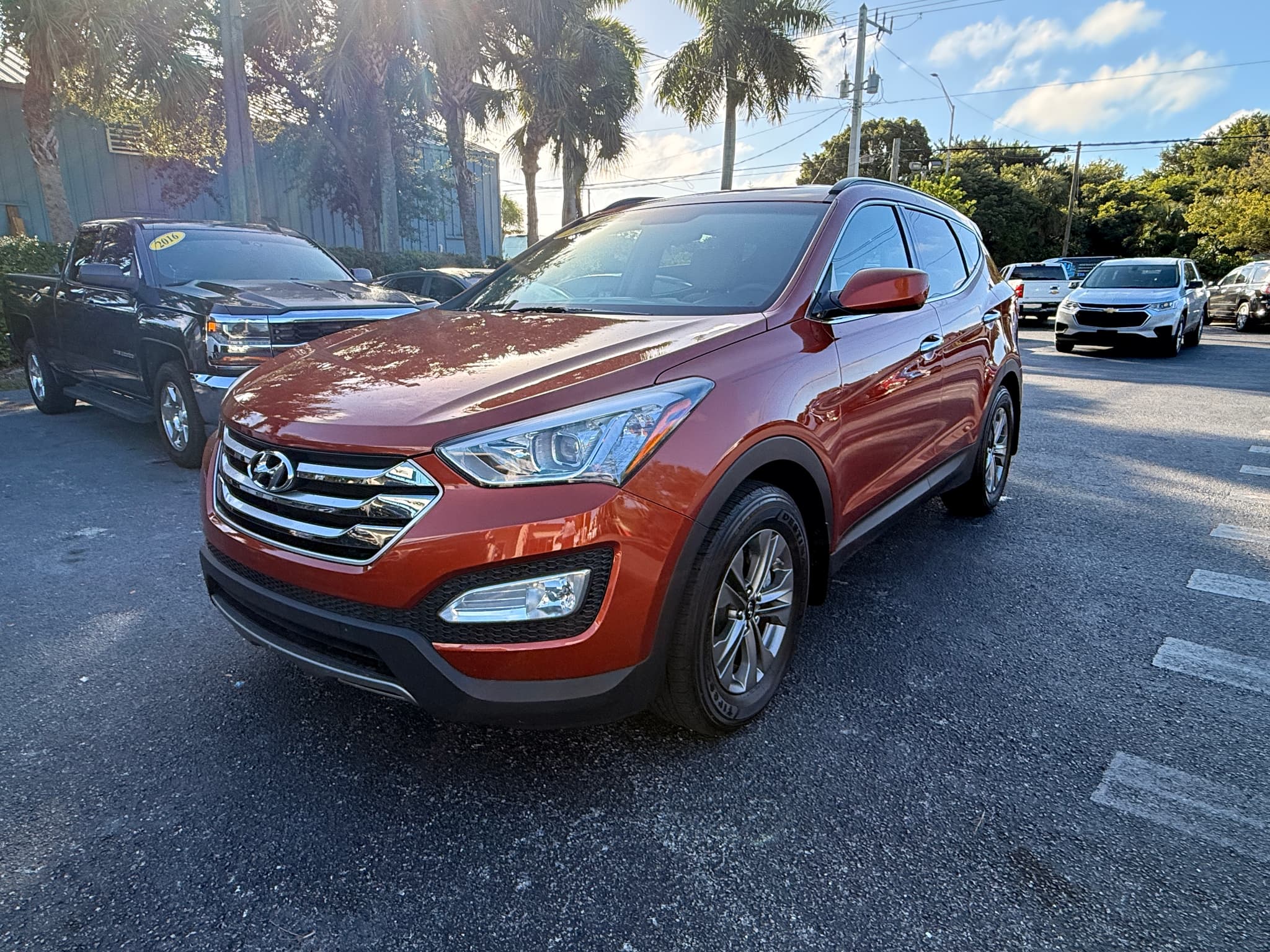 Orange 2016 Hyundai Santa Fe Sport Popular/Turbo Base/Turbo Leather for sale in Naples, FL (1/17)